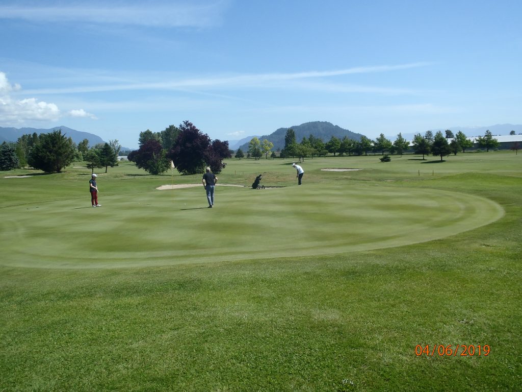 Royalwood Golf Course with mountain backdrop